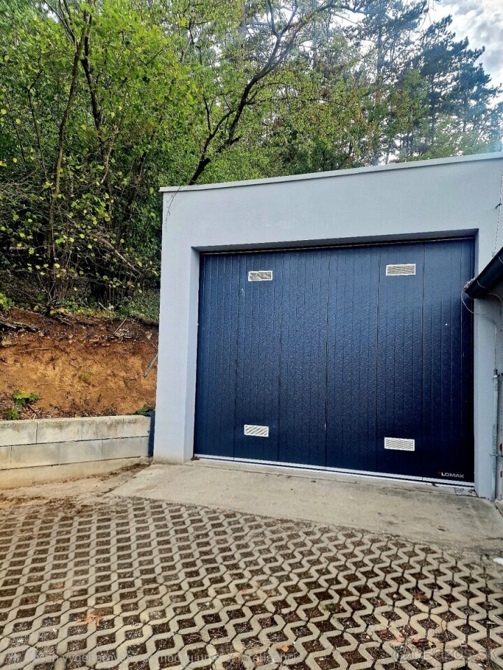 Murovaná garáž s elektrickou bránou na predaj - 49m2