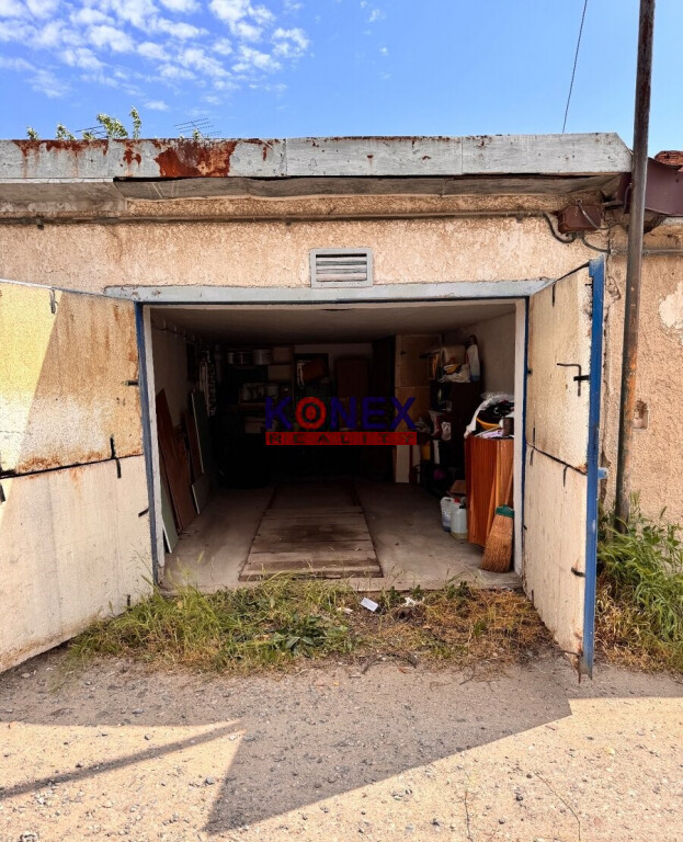 Predaj garáže v Kráľovskom Chlmci – 20 m2 s montážnou jamou