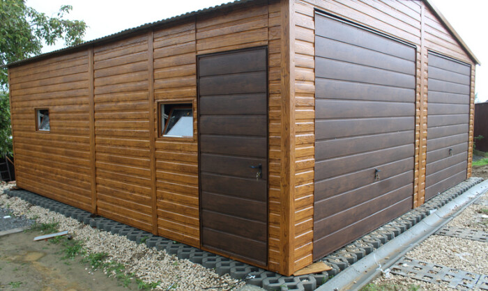 Predaj plechovej garáže 7x9 m s výklopnými bránami